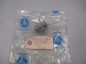 Small metal Yamaha motorbike part in a clear plastic bag with Yamaha Genuine Parts logos and the label 109-81321-20/1 PC 316.