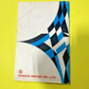 s-l140-1 White product packaging box with a blue geometric pattern on a bright yellow surface.