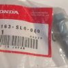 Honda genuine parts bag with a small black automotive part; label reads 90163-SLO-000 and Made in Japan.