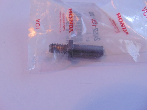 Black bolt with a washer in a clear Honda-branded plastic bag, likely a small automotive fastener.