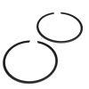 Two black metal split rings with small gaps on a white background.