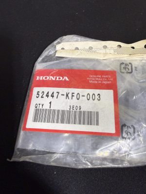 Honda genuine parts package showing part number 52447-KF0-003 with a red label and barcode
