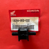Honda genuine parts label with part number 18354-950-000 and a black threaded bolt/component in front of the tag.”,