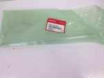 Green translucent plastic bag with a red Honda genuine parts label in the center (text includes 53521-HP1-000).