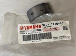 Small curved metal strap with two holes in Yamaha Genuine Parts bag