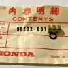 Honda contents tag showing Part No. 99202-601, with brass component and black O-ring.
